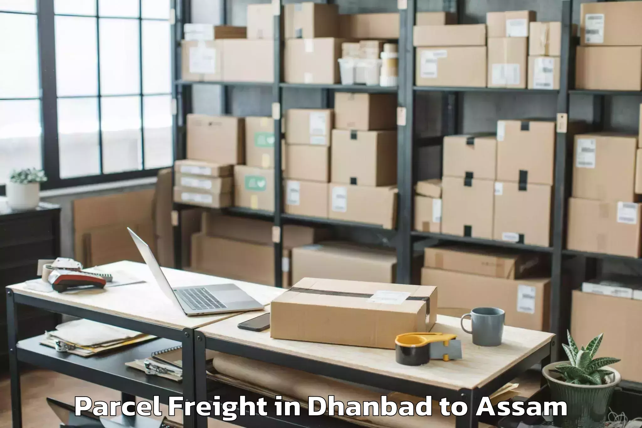 Leading Dhanbad to Sarupeta Pt Parcel Freight Provider